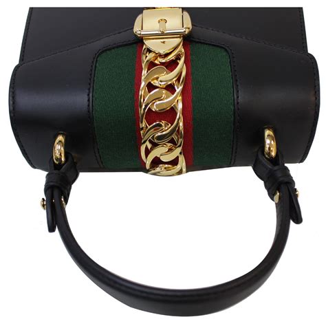 gucci sylvie mini leather crossbody bag|2000.